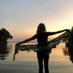 Building Blocks Shawl on the dock during sunset.